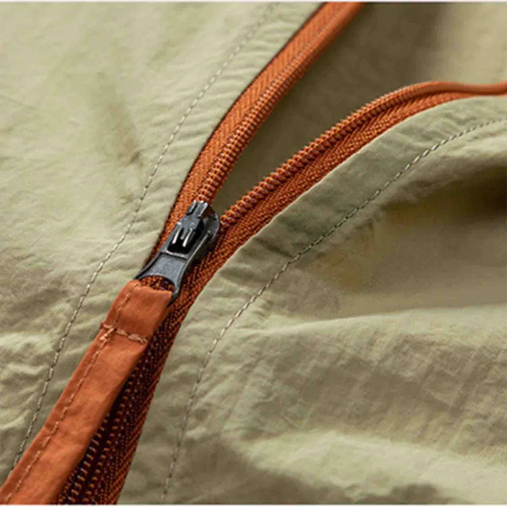 Jaqueta Corta Vento Masculina Romenzi RZ237, design funcional, proteção contra chuva e vento para atividades ao ar livre.