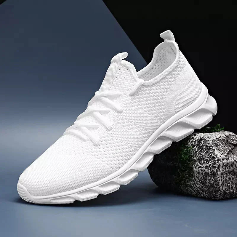 Tênis Romenzi RZ433 branco com solado ergonômico Confort Max, malha respirável Air Tech e design leve e moderno para uso diário.