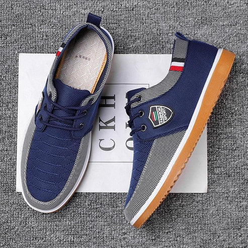 Tênis Masculino Romenzi RZ380 azul e caramelo, com ventilação, palmilha em E.V.A e sola de borracha antiderrapante para estilo urbano e conforto diário