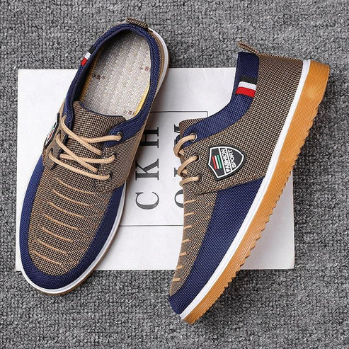 Tênis Masculino Romenzi RZ380 azul e caramelo, com ventilação, palmilha em E.V.A e sola de borracha antiderrapante para estilo urbano e conforto diário