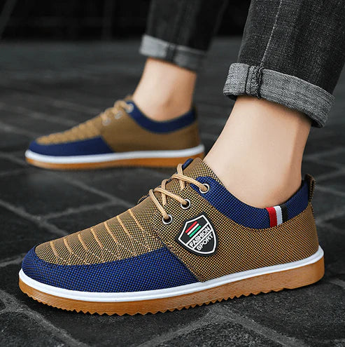Tênis Masculino Romenzi RZ380 azul e caramelo, com ventilação, palmilha em E.V.A e sola de borracha antiderrapante para estilo urbano e conforto diário