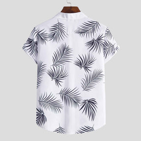 Camisa Manga Curta Romenzi Ipanema RZ584 feita em tecido leve de alta qualidade, com estampa minimalista de folhas que une frescor, estilo e sofisticação.