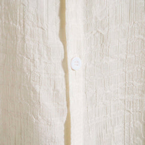 Camisa Manga Curta Romenzi Playa Off White RZ591 em tecido leve, com design sofisticado e caimento impecável para ocasiões casuais e dias ensolarados.