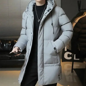 Jaqueta Longa Puffer Masculina Romenzi RZ145 com acolchoamento térmico, tecido impermeável e design refinado para proteção e estilo no inverno.
