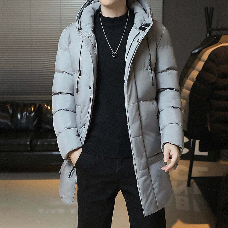 Jaqueta Longa Puffer Masculina Romenzi RZ145 com acolchoamento térmico, tecido impermeável e design refinado para proteção e estilo no inverno.