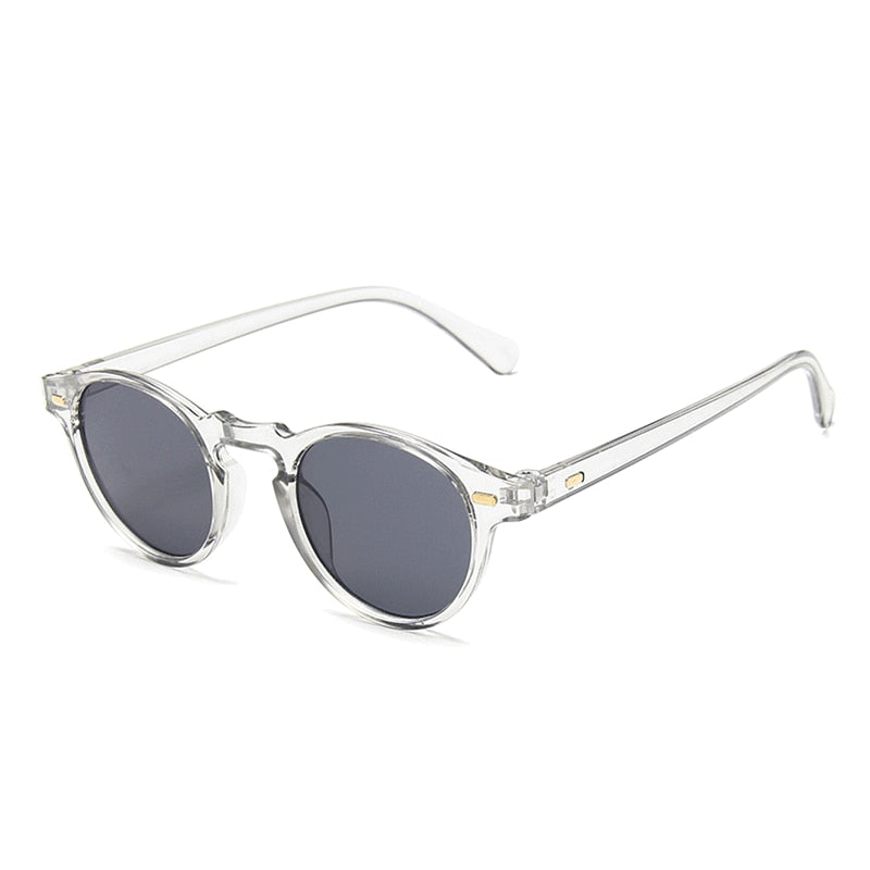 Óculos de Sol Romenzi Barcelona RZ682 em detalhe, modelo inspirado em Barcelona com lentes de policarbonato e proteção UV400 que combinam estilo e elegância.