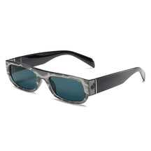 Óculos de Sol Romenzi Phuket RZ693 em destaque, modelo moderno feito em acetato com lentes de policarbonato UV400 que oferecem proteção, conforto e estilo.