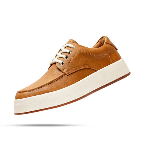 Tênis Masculino em Couro Romenzi RZ386 caramelo ou cinza com visual minimalista, sola durável e acabamento elegante para uso casual e moderno.