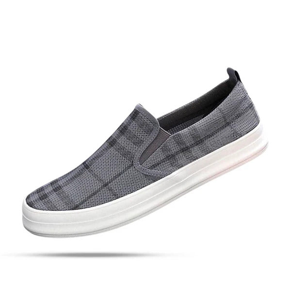 Tênis Masculino Slip On Romenzi RZ407 em preto, cinza, bege e verde musgo, com visual contemporâneo e acabamento que oferece conforto e leveza.