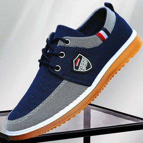 Tênis Masculino Romenzi RZ380 azul e caramelo, com ventilação, palmilha em E.V.A e sola de borracha antiderrapante para estilo urbano e conforto diário
