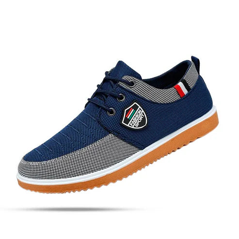 Tênis Masculino Romenzi RZ380 azul e caramelo, com ventilação, palmilha em E.V.A e sola de borracha antiderrapante para estilo urbano e conforto diário